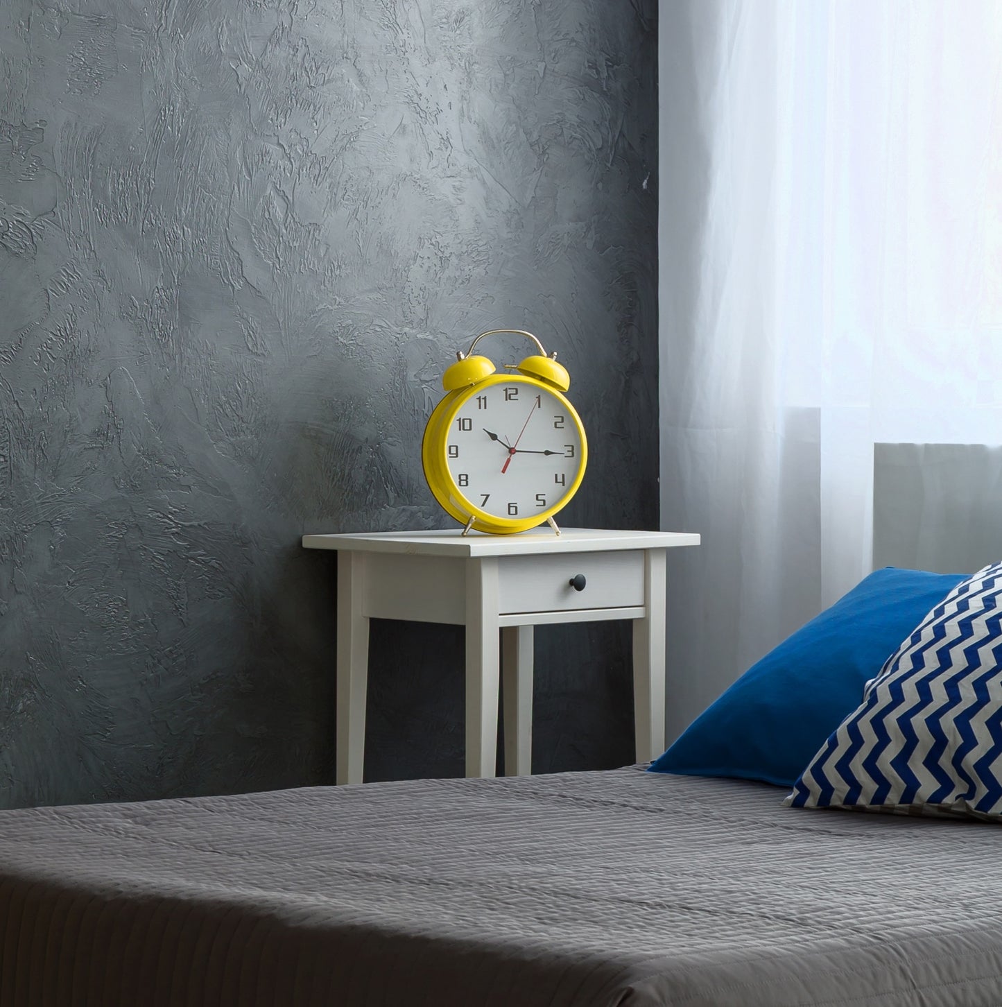 Yellow bell alarm clock