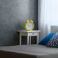Yellow bell alarm clock